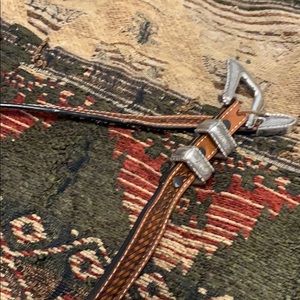 Brown tooled belt
